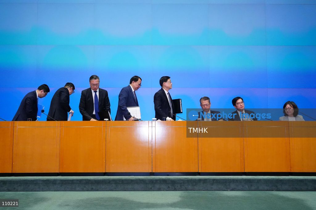 Senior Hong Kong government officials leave the venue following a press conference on the release of the independent inquiry report into the deadly Wang Fuk Court fire at the Central Government Offices in Hong Kong on October 29, 2026. (Photo by Zulu Lo/TMHK via Nexpher Images)
