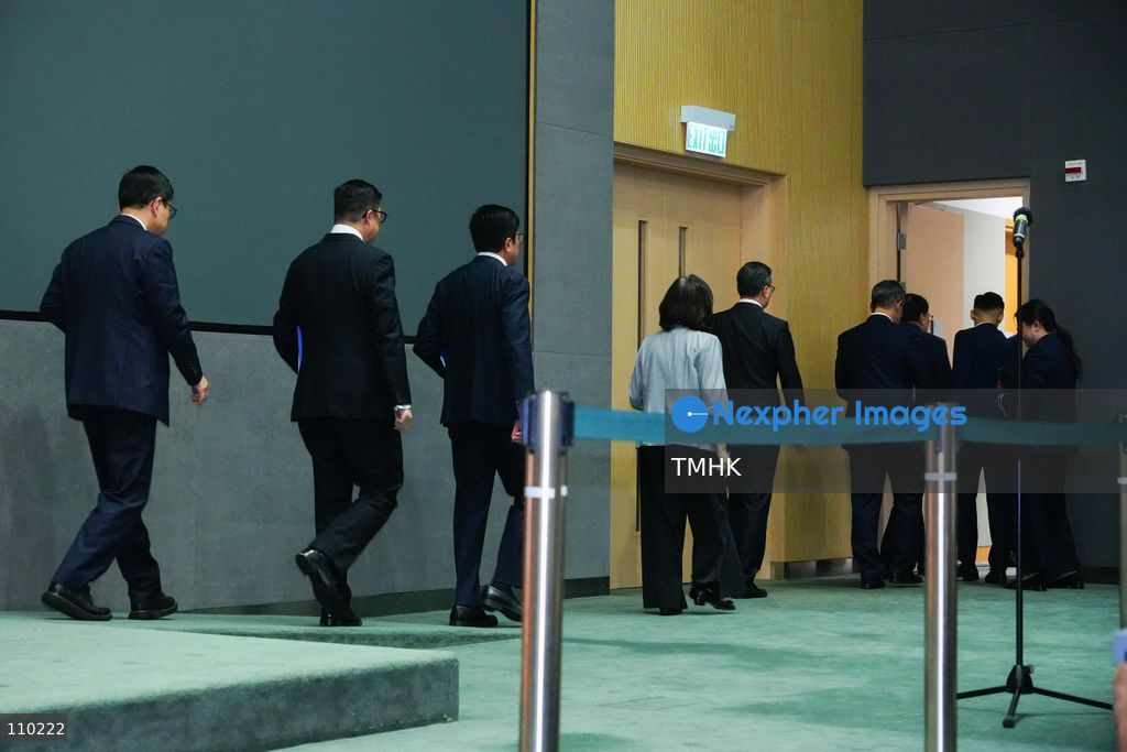 Senior Hong Kong government officials leave the venue following a press conference on the release of the independent inquiry report into the deadly Wang Fuk Court fire at the Central Government Offices in Hong Kong on October 29, 2026. (Photo by Zulu Lo/TMHK via Nexpher Images)