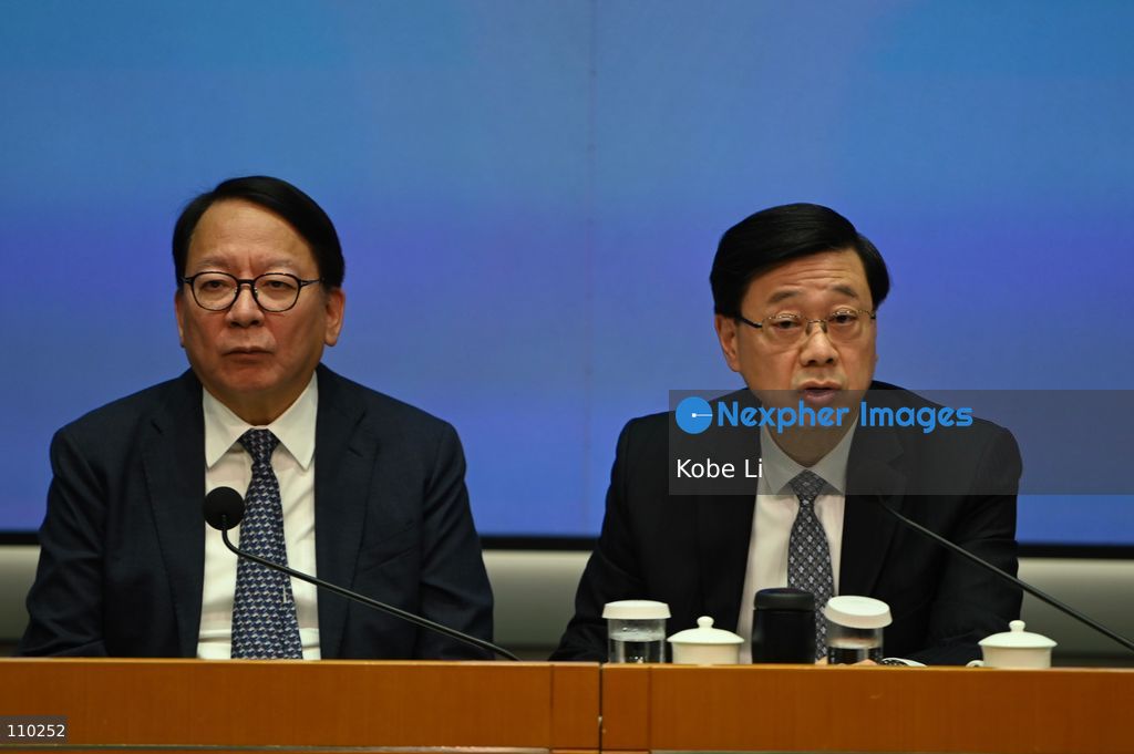 John Lee, The Chief Executive, Eric Chan, Hong Kong Secretary for Administration, and relevant officials hold a press conference to the report of the Independent Committee in relation to the fire at Wang Fuk Court in Tai Po on October 29, 2026 in Hong Kong. (Photo by Kobe Li/Nexpher Images)