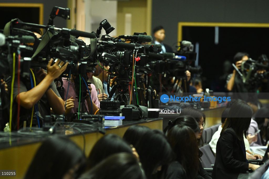 Media working during Hong Kong Chief Executive John Lee, and relevant officials hold a press conference to the report of the Independent Committee in relation to the fire at Wang Fuk Court in Tai Po on October 29, 2026 in Hong Kong. (Photo by Kobe Li/Nexpher Images)