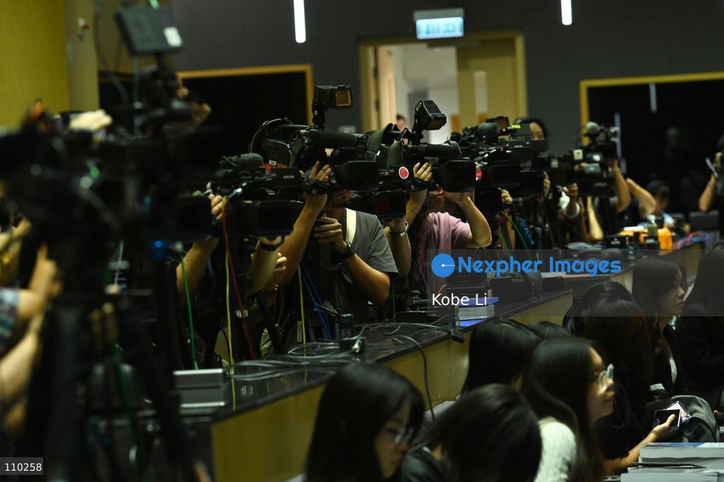 Media working during Hong Kong Chief Executive John Lee, and relevant officials hold a press conference to the report of the Independent Committee in relation to the fire at Wang Fuk Court in Tai Po on October 29, 2026 in Hong Kong. (Photo by Kobe Li/Nexpher Images)