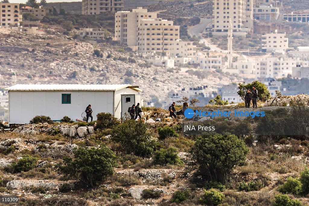 ATARA, PALESTINE, OCTOBER 29, 2026: Israeli forces evacuate an illegal settlement outpost built on land belonging to the Palestinian village of Atara, north of Ramallah in the occupied West Bank, for the third time. According to the information provided, settlers have returned to the site after previous evacuations, expanded the outpost and added new caravans. The repeated evacuations and subsequent returns highlight the ongoing dispute over land in the occupied West Bank and the continued establishment and expansion of Israeli settler outposts on Palestinian-owned land. (Photo by Salman Mohsen Alkhatib/JNA Press via Nexpher Images)