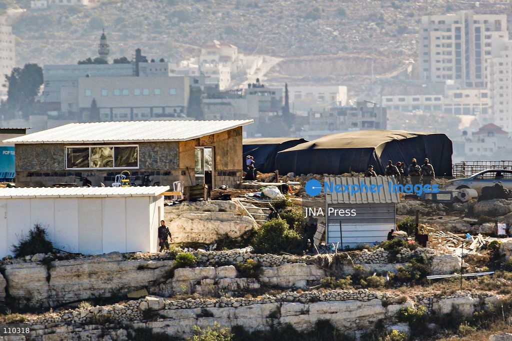 ATARA, PALESTINE, OCTOBER 29, 2026: Israeli forces evacuate an illegal settlement outpost built on land belonging to the Palestinian village of Atara, north of Ramallah in the occupied West Bank, for the third time. According to the information provided, settlers have returned to the site after previous evacuations, expanded the outpost and added new caravans. The repeated evacuations and subsequent returns highlight the ongoing dispute over land in the occupied West Bank and the continued establishment and expansion of Israeli settler outposts on Palestinian-owned land. (Photo by Salman Mohsen Alkhatib/JNA Press via Nexpher Images)