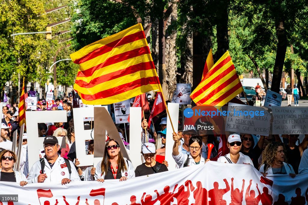 BARCELONA, SPAIN, OCTOBER 28, 2026: Doctors march through Barcelona on the first day of an indefinite strike called by the Metges de Catalunya union. Demonstrators demand improved pay and working conditions, reduced workloads and a specific employment framework for medical professionals. The march heads towards the Catalan Health Department headquarters. (Photo by Miguel Galmés/JNA Press via Nexpher Images)