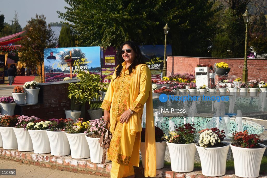 SRINAGAR, INDIA, OCTOBER 29, 2026: Visitors explore Bagh-e-Gul-e-Dawood, a chrysanthemum garden at the Nehru Memorial Botanical Garden in Srinagar, Jammu and Kashmir. The seasonal display features around 350,000 chrysanthemum plants across more than 70 varieties, forming part of efforts to extend Kashmir’s floral tourism season into autumn and early winter. (Photo by Danish Showkat/JNA Press via Nexpher Images)