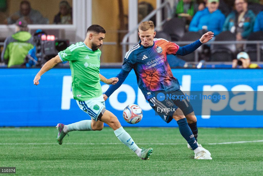 Mateusz Bogusz #19 of Houston Dynamo FC and Alex Roldan #16 of Seattle Sounders FC battle for the ball during the MLS match between Seattle Sounders FC and Houston Dynamo FC at Lumen Field. on October 28, 2026 in Seattle, Washington. (Photo by Jules Doyle / Eyepix Group/Eyepix via Nexpher Images)