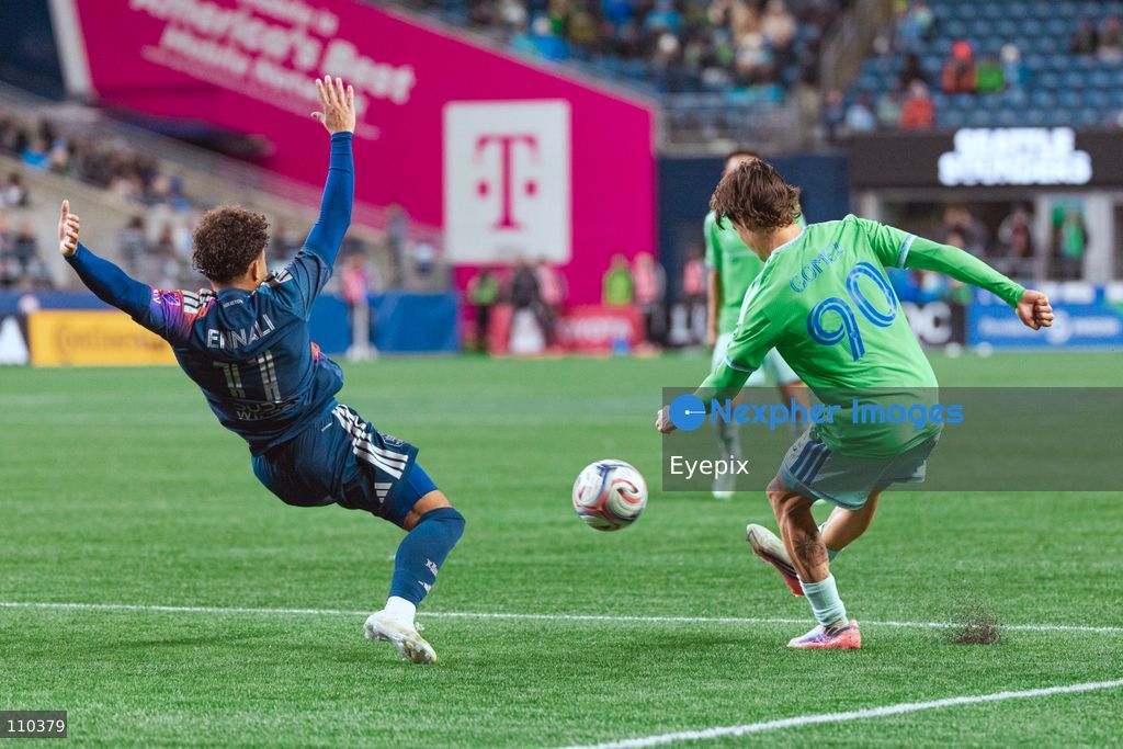 Sebastian Gomez #90 of Seattle Sounders FC is pressured by Lawrence Ennali #11 of Houston Dynamo FC during the MLS match between Seattle Sounders FC and Houston Dynamo FC at Lumen Field. on October 28, 2026 in Seattle, Washington. (Photo by Jules Doyle / Eyepix Group/Eyepix via Nexpher Images)
