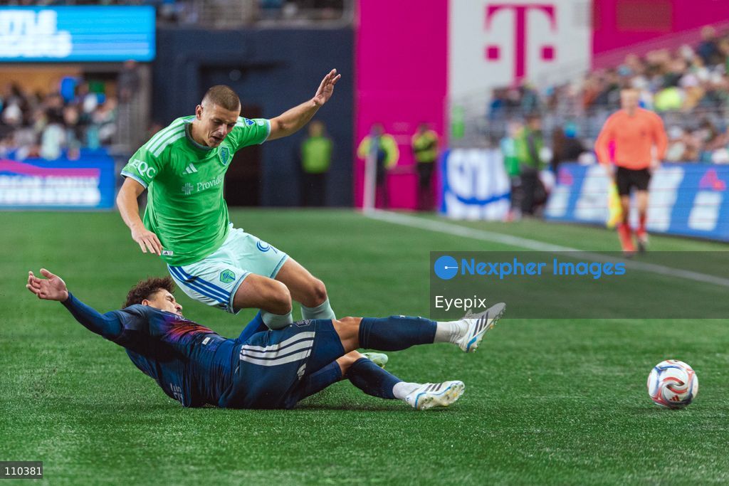 Dejan Joveljić #9 of Seattle Sounders FC and Lucas Halter #5 of Houston Dynamo FC battle for the ball during the MLS match between Seattle Sounders FC and Houston Dynamo FC at Lumen Field. on October 28, 2026 in Seattle, Washington. (Photo by Jules Doyle / Eyepix Group/Eyepix via Nexpher Images)