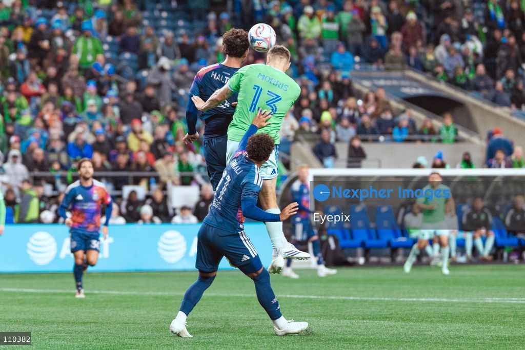 Jordan Morris #13 of Seattle Sounders FC and Lucas Halter #5 of Houston Dynamo FC battle for the header during the MLS match between Seattle Sounders FC and Houston Dynamo FC at Lumen Field. on October 28, 2026 in Seattle, Washington. (Photo by Jules Doyle / Eyepix Group/Eyepix via Nexpher Images)