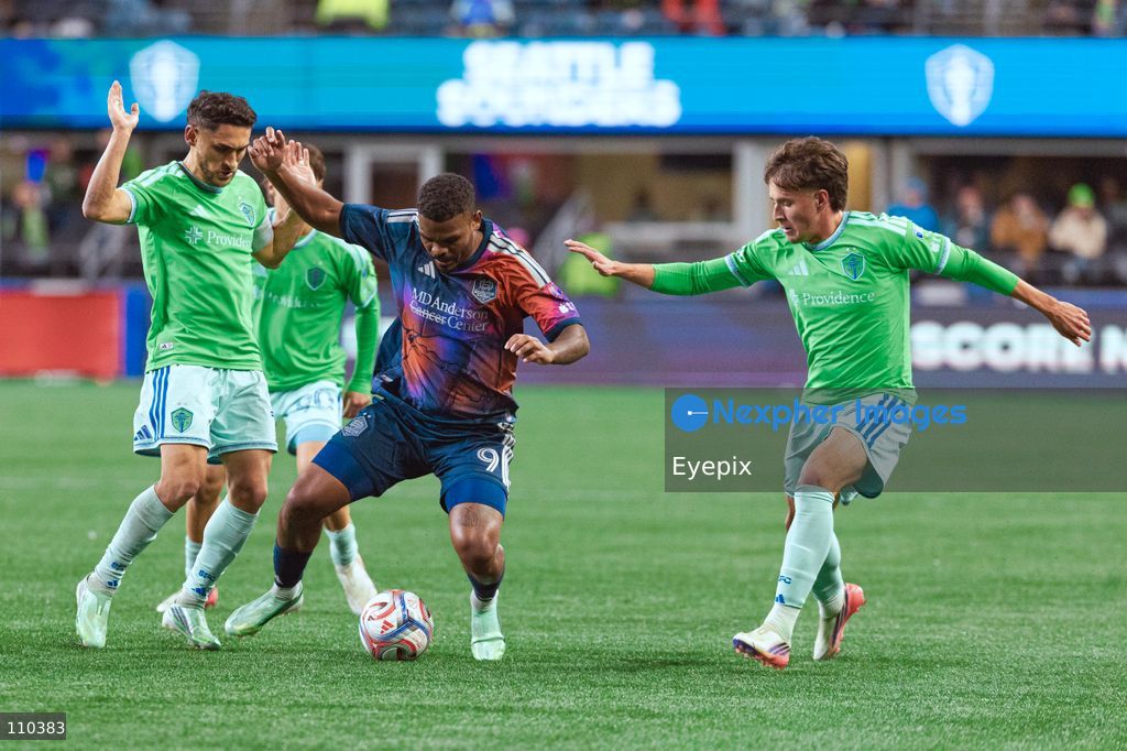 Lyle Foster #9 of Houston Dynamo FC is pressured by Cristian Roldan #7 and Sebastian Gomez #90 of Seattle Sounders FC during the MLS match between Seattle Sounders FC and Houston Dynamo FC at Lumen Field. on October 28, 2026 in Seattle, Washington. (Photo by Jules Doyle / Eyepix Group/Eyepix via Nexpher Images)