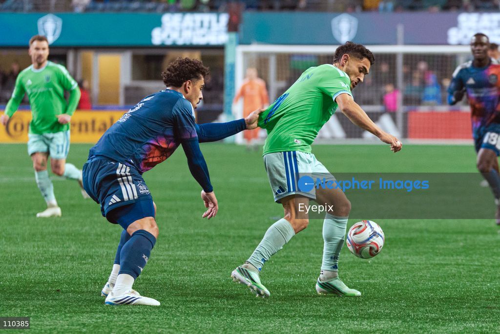 Cristian Roldan #7 of Seattle Sounders FC and Lawrence Ennali #11 of Houston Dynamo FC battle for the ball during the MLS match between Seattle Sounders FC and Houston Dynamo FC at Lumen Field. on October 28, 2026 in Seattle, Washington. (Photo by Jules Doyle / Eyepix Group/Eyepix via Nexpher Images)