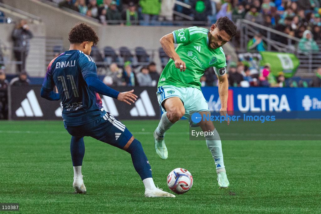 Cristian Roldan #7 of Seattle Sounders FC and Lawrence Ennali #11 of Houston Dynamo FC battle for the ball during the MLS match between Seattle Sounders FC and Houston Dynamo FC at Lumen Field. on October 28, 2026 in Seattle, Washington. (Photo by Jules Doyle / Eyepix Group/Eyepix via Nexpher Images)