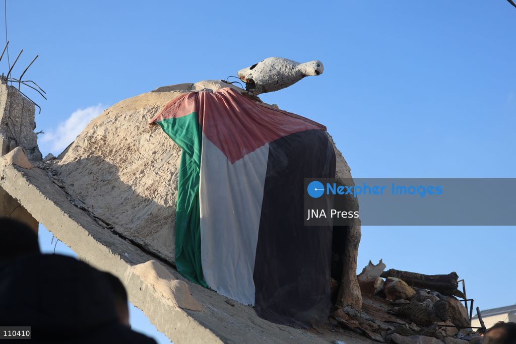 DURA, PALESTINE, OCTOBER 29, 2026: Israeli forces use a military bulldozer to demolish a memorial mural depicting Bajis Abu Atwan in the town of Dura, southwest of Hebron in the occupied West Bank. The demolition takes place during an Israeli military raid on the town. (Photo by Mosab shawer/JNA Press via Nexpher Images)