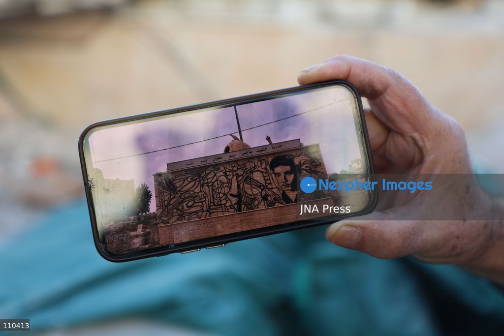 DURA, PALESTINE, OCTOBER 29, 2026: Israeli forces use a military bulldozer to demolish a memorial mural depicting Bajis Abu Atwan in the town of Dura, southwest of Hebron in the occupied West Bank. The demolition takes place during an Israeli military raid on the town. (Photo by Mosab shawer/JNA Press via Nexpher Images)