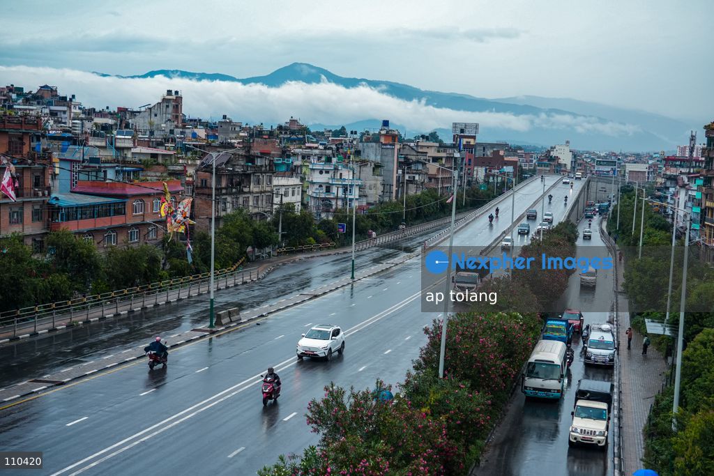 Lalitpur, NEPAL – OCTOBER 30, 2026: Continuous rainfall caused by the remnants of Cyclone Arnab has disrupted daily life in Lalitpur, Nepal. People are seen wearing raincoats and carrying umbrellas as they go about their daily activities amid persistent rain since last night. (Photo by ap tolang/Nexpher Images)