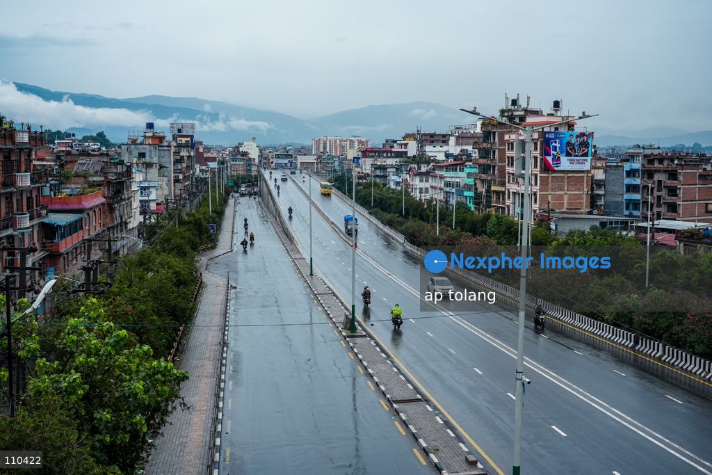 Lalitpur, NEPAL – OCTOBER 30, 2026: Continuous rainfall caused by the remnants of Cyclone Arnab has disrupted daily life in Lalitpur, Nepal. People are seen wearing raincoats and carrying umbrellas as they go about their daily activities amid persistent rain since last night. (Photo by ap tolang/Nexpher Images)