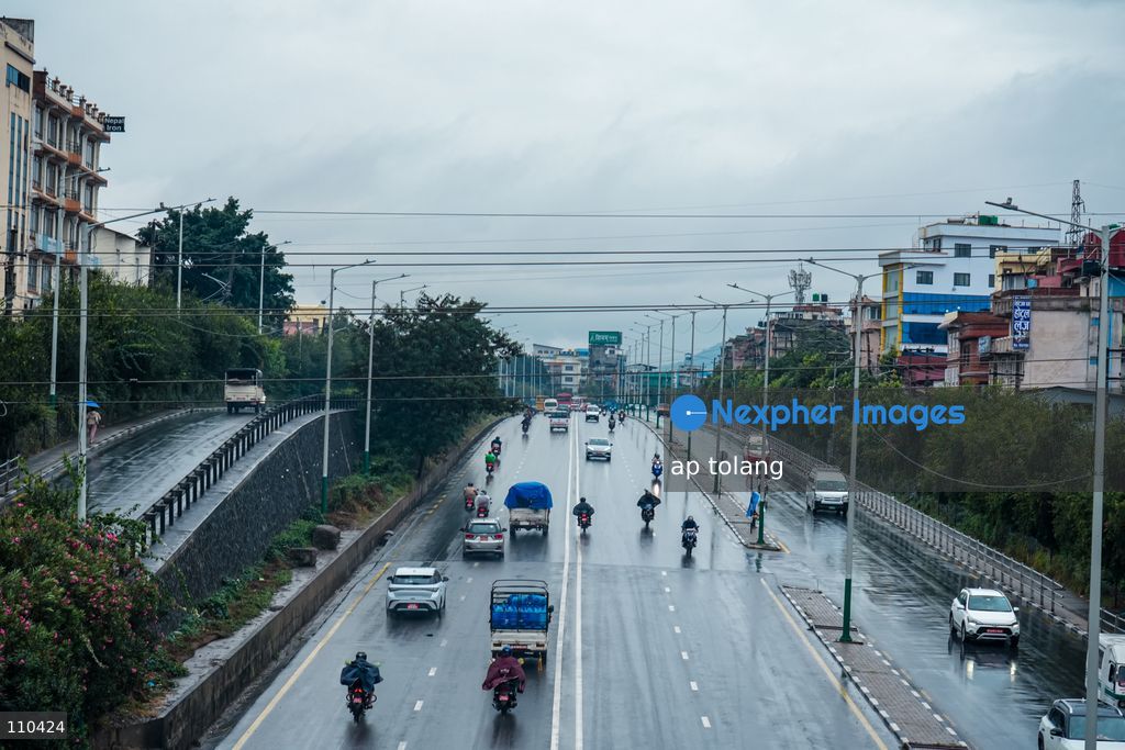 Lalitpur, NEPAL – OCTOBER 30, 2026: Continuous rainfall caused by the remnants of Cyclone Arnab has disrupted daily life in Lalitpur, Nepal. People are seen wearing raincoats and carrying umbrellas as they go about their daily activities amid persistent rain since last night. (Photo by ap tolang/Nexpher Images)