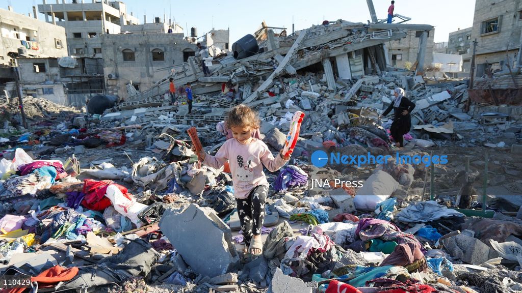 BUREIJ REFUGEE CAMP, PALESTINE, OCTOBER 30, 2026: Rubble covers the site of the al-Qarinawi family’s home following an Israeli airstrike in Bureij refugee camp in the central Gaza Strip. The strike on October 29 destroyed the residential building and caused extensive damage to surrounding homes. (Photo by Ramzi Abu Amer/JNA Press via Nexpher Images)