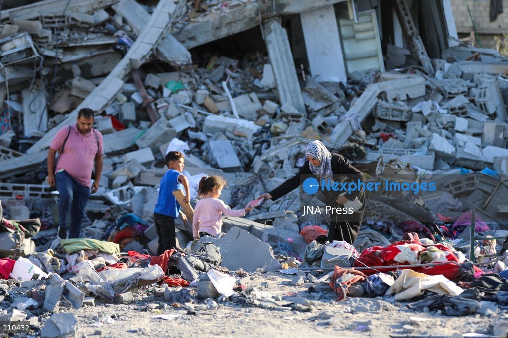 BUREIJ REFUGEE CAMP, PALESTINE, OCTOBER 30, 2026: Rubble covers the site of the al-Qarinawi family’s home following an Israeli airstrike in Bureij refugee camp in the central Gaza Strip. The strike on October 29 destroyed the residential building and caused extensive damage to surrounding homes. (Photo by Ramzi Abu Amer/JNA Press via Nexpher Images)