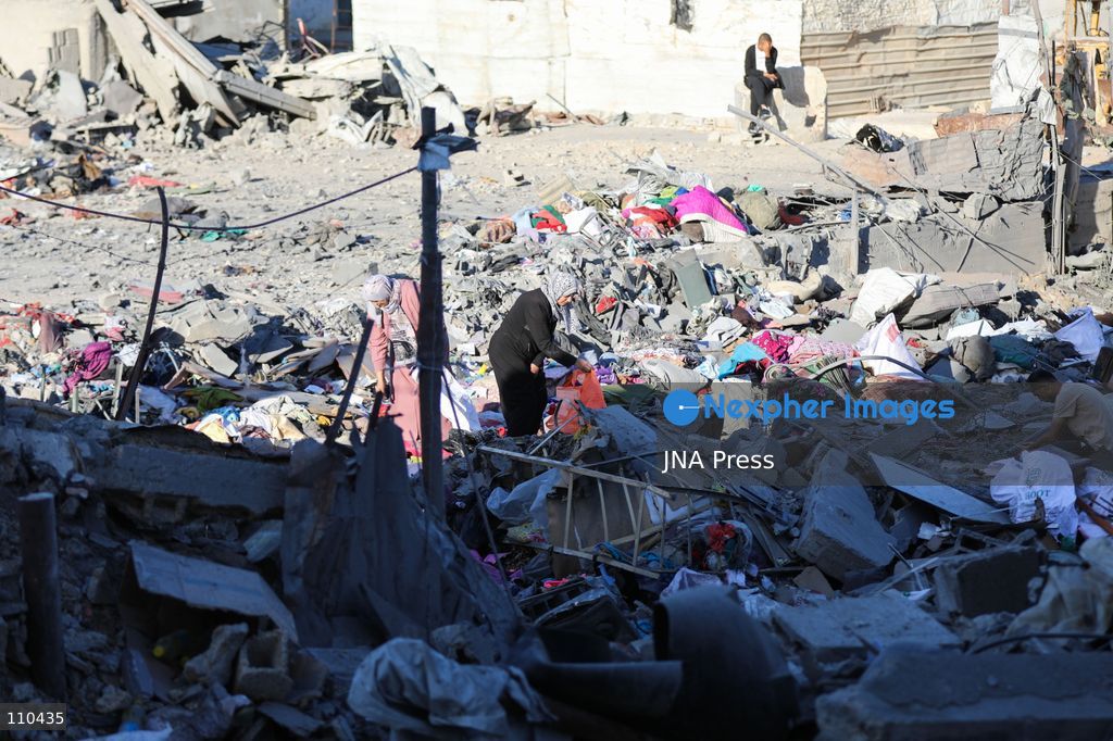 BUREIJ REFUGEE CAMP, PALESTINE, OCTOBER 30, 2026: Rubble covers the site of the al-Qarinawi family’s home following an Israeli airstrike in Bureij refugee camp in the central Gaza Strip. The strike on October 29 destroyed the residential building and caused extensive damage to surrounding homes. (Photo by Ramzi Abu Amer/JNA Press via Nexpher Images)