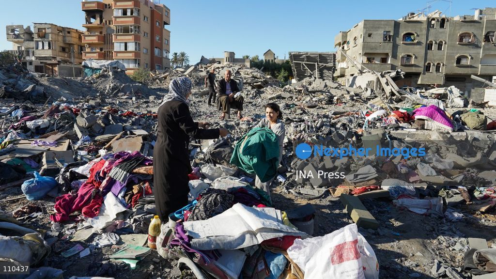 BUREIJ REFUGEE CAMP, PALESTINE, OCTOBER 30, 2026: Rubble covers the site of the al-Qarinawi family’s home following an Israeli airstrike in Bureij refugee camp in the central Gaza Strip. The strike on October 29 destroyed the residential building and caused extensive damage to surrounding homes. (Photo by Ramzi Abu Amer/JNA Press via Nexpher Images)