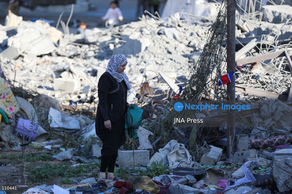 BUREIJ REFUGEE CAMP, PALESTINE, OCTOBER 30, 2026: Rubble covers the site of the al-Qarinawi family’s home following an Israeli airstrike in Bureij refugee camp in the central Gaza Strip. The strike on October 29 destroyed the residential building and caused extensive damage to surrounding homes. (Photo by Ramzi Abu Amer/JNA Press via Nexpher Images)