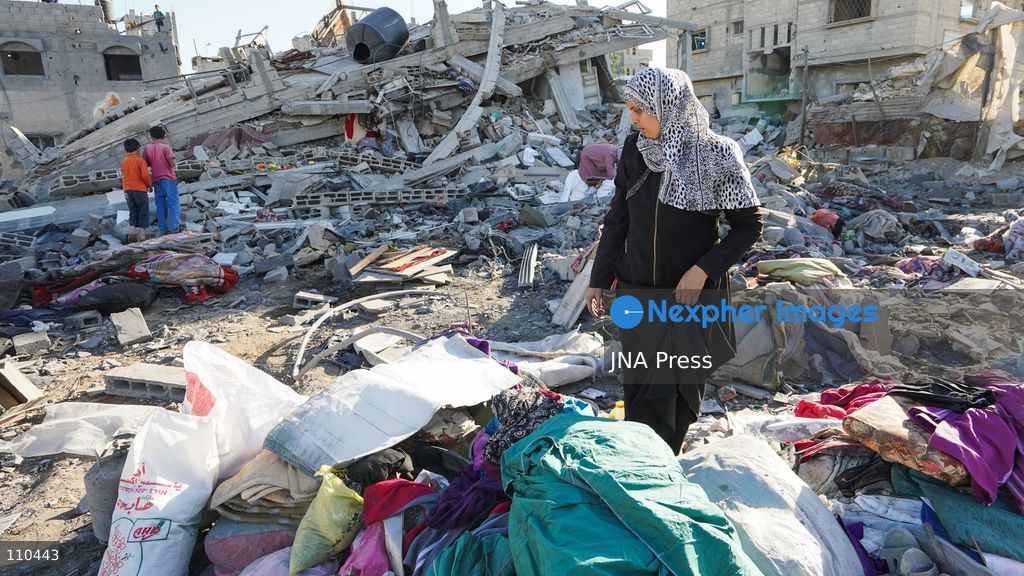 BUREIJ REFUGEE CAMP, PALESTINE, OCTOBER 30, 2026: Rubble covers the site of the al-Qarinawi family’s home following an Israeli airstrike in Bureij refugee camp in the central Gaza Strip. The strike on October 29 destroyed the residential building and caused extensive damage to surrounding homes. (Photo by Ramzi Abu Amer/JNA Press via Nexpher Images)