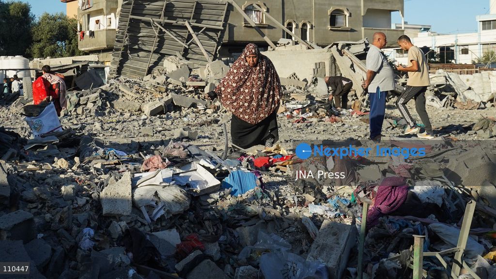 BUREIJ REFUGEE CAMP, PALESTINE, OCTOBER 30, 2026: Rubble covers the site of the al-Qarinawi family’s home following an Israeli airstrike in Bureij refugee camp in the central Gaza Strip. The strike on October 29 destroyed the residential building and caused extensive damage to surrounding homes. (Photo by Ramzi Abu Amer/JNA Press via Nexpher Images)