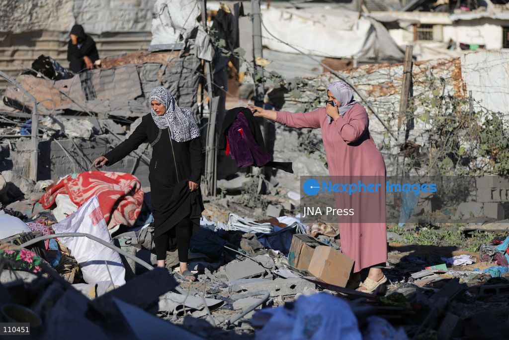 BUREIJ REFUGEE CAMP, PALESTINE, OCTOBER 30, 2026: Rubble covers the site of the al-Qarinawi family’s home following an Israeli airstrike in Bureij refugee camp in the central Gaza Strip. The strike on October 29 destroyed the residential building and caused extensive damage to surrounding homes. (Photo by Ramzi Abu Amer/JNA Press via Nexpher Images)