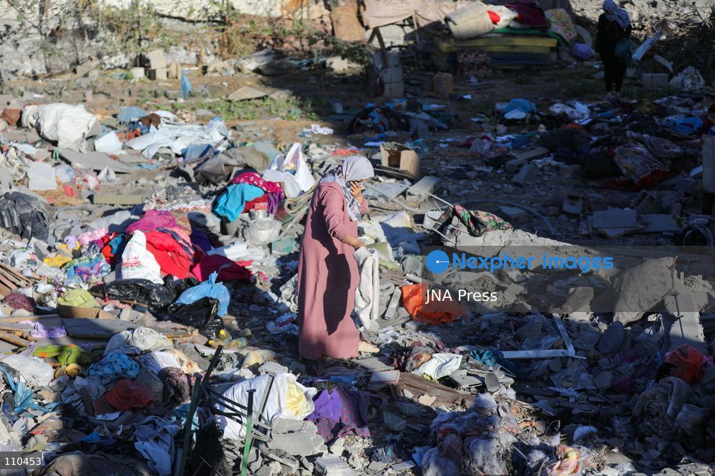 BUREIJ REFUGEE CAMP, PALESTINE, OCTOBER 30, 2026: Rubble covers the site of the al-Qarinawi family’s home following an Israeli airstrike in Bureij refugee camp in the central Gaza Strip. The strike on October 29 destroyed the residential building and caused extensive damage to surrounding homes. (Photo by Ramzi Abu Amer/JNA Press via Nexpher Images)
