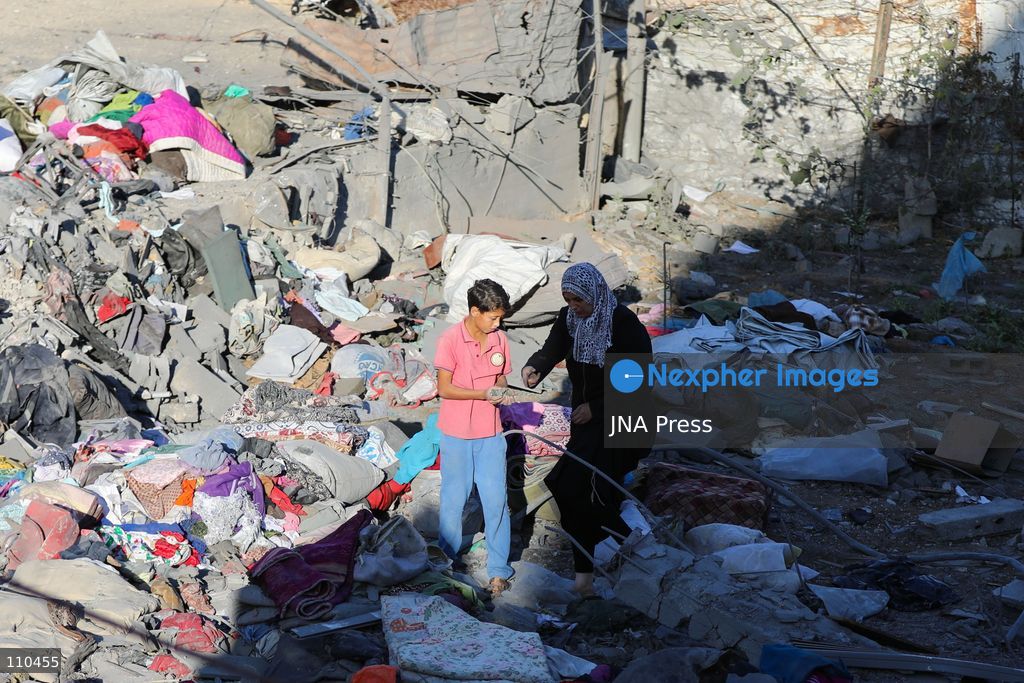 BUREIJ REFUGEE CAMP, PALESTINE, OCTOBER 30, 2026: Rubble covers the site of the al-Qarinawi family’s home following an Israeli airstrike in Bureij refugee camp in the central Gaza Strip. The strike on October 29 destroyed the residential building and caused extensive damage to surrounding homes. (Photo by Ramzi Abu Amer/JNA Press via Nexpher Images)