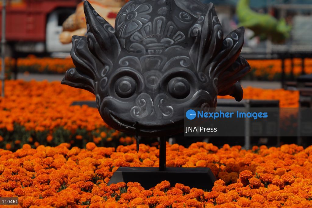 A monumental Catrina stands in Mexico City's Zócalo as the centerpiece of the 2026 Ofrenda Monumental. The roughly 32-meter figure, created by the Xibalbá art workshop, was unveiled as part of the Day of the Dead offering, which organizers said set a Guinness World Record for the tallest Catrina. The installation also features pieces from the exhibition "Ajolotes en el Corazón" and cempasúchil flowers. (Photo by Carlos Santiago/JNA Press via Nexpher Images)