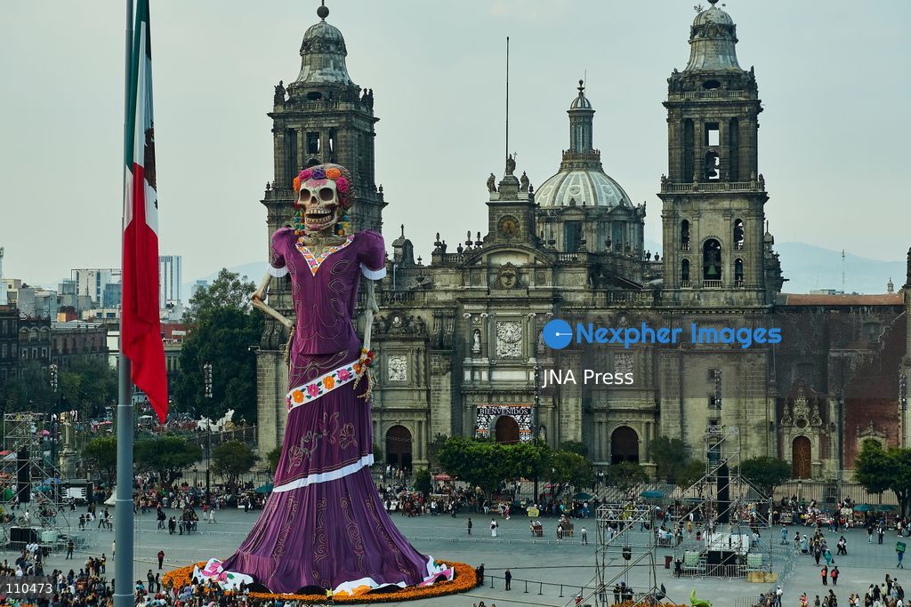 MEXICO CITY, MEXICO - OCTOBER 29, 2026: A massive catrina sculpture stands in the Zócalo plaza ahead of Day of the Dead festivities. Organizers state the 33-meter installation has set a Guinness World Record for the tallest catrina, alongside traditional "ofrendas" and decorative lighting. (Photo by Juan Perez Puente/JNA Press via Nexpher Images)