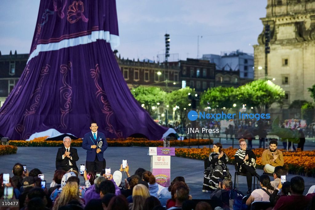 MEXICO CITY, MEXICO - OCTOBER 29, 2026: A massive catrina sculpture stands in the Zócalo plaza ahead of Day of the Dead festivities. Organizers state the 33-meter installation has set a Guinness World Record for the tallest catrina, alongside traditional "ofrendas" and decorative lighting. (Photo by Juan Perez Puente/JNA Press via Nexpher Images)