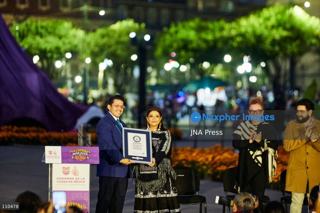 MEXICO CITY, MEXICO - OCTOBER 29, 2026: A massive catrina sculpture stands in the Zócalo plaza ahead of Day of the Dead festivities. Organizers state the 33-meter installation has set a Guinness World Record for the tallest catrina, alongside traditional "ofrendas" and decorative lighting. (Photo by Juan Perez Puente/JNA Press via Nexpher Images)