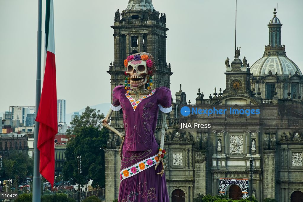 MEXICO CITY, MEXICO - OCTOBER 29, 2026: A massive catrina sculpture stands in the Zócalo plaza ahead of Day of the Dead festivities. Organizers state the 33-meter installation has set a Guinness World Record for the tallest catrina, alongside traditional "ofrendas" and decorative lighting. (Photo by Juan Perez Puente/JNA Press via Nexpher Images)