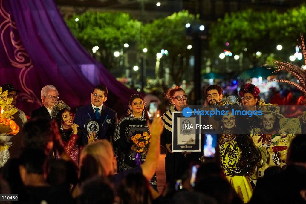 MEXICO CITY, MEXICO - OCTOBER 29, 2026: A massive catrina sculpture stands in the Zócalo plaza ahead of Day of the Dead festivities. Organizers state the 33-meter installation has set a Guinness World Record for the tallest catrina, alongside traditional "ofrendas" and decorative lighting. (Photo by Juan Perez Puente/JNA Press via Nexpher Images)