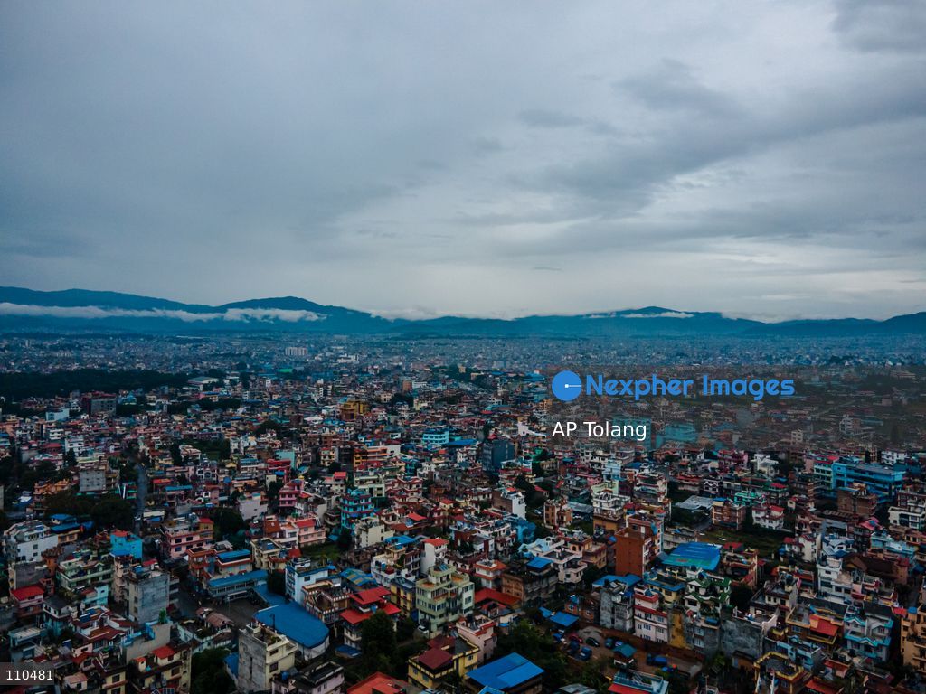 Lalitpur, NEPAL – OCTOBER 30, 2026: An aerial view shows the cityscape under rainy skies in Lalitpur, Nepal. Continuous rainfall triggered by the remnants of Cyclone Arnab has blanketed the Kathmandu Valley, disrupting daily activities and leaving urban areas under persistent cloudy and wet conditions. (Photo by AP Tolang/Nexpher Images)