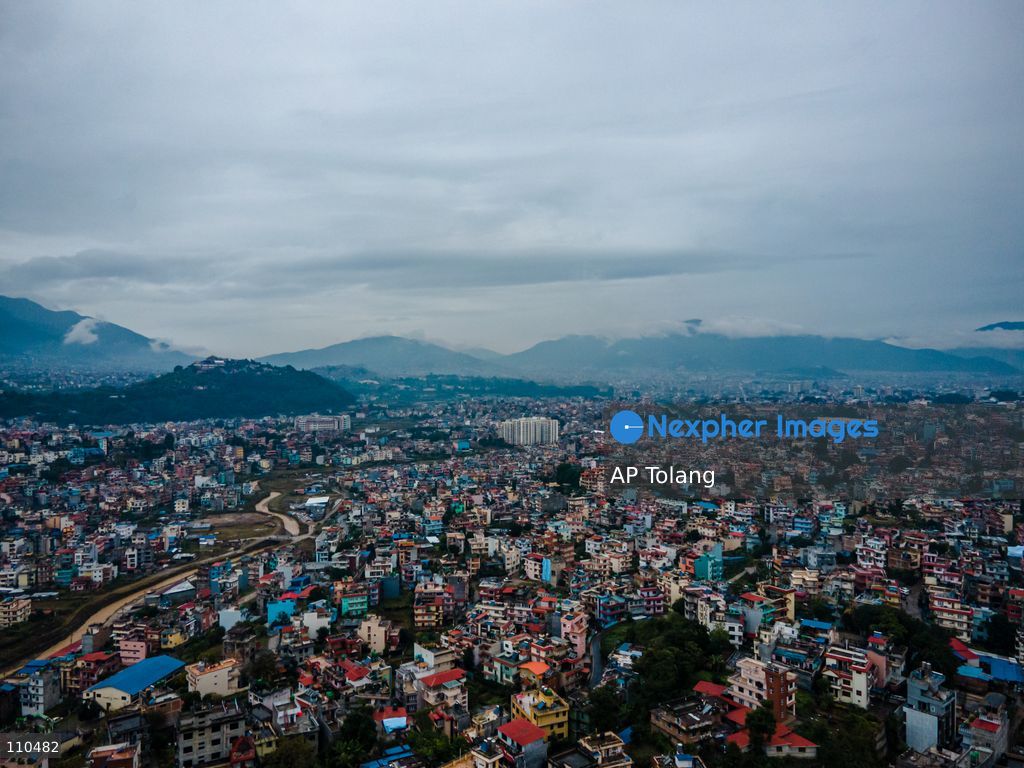 Lalitpur, NEPAL – OCTOBER 30, 2026: An aerial view shows the cityscape under rainy skies in Lalitpur, Nepal. Continuous rainfall triggered by the remnants of Cyclone Arnab has blanketed the Kathmandu Valley, disrupting daily activities and leaving urban areas under persistent cloudy and wet conditions. (Photo by AP Tolang/Nexpher Images)