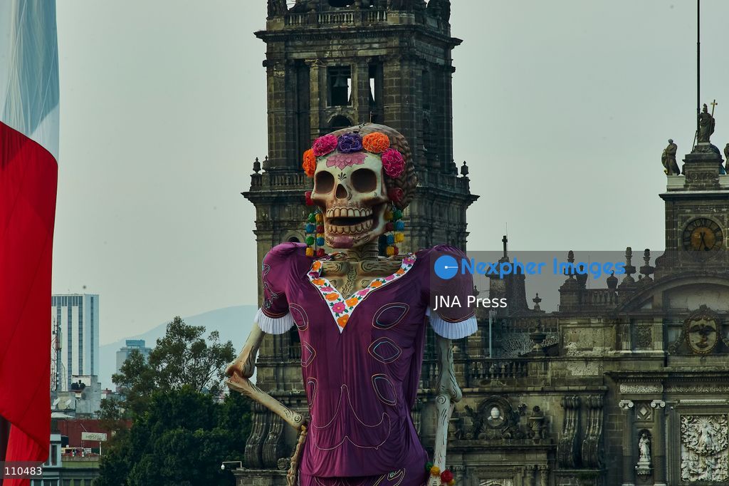 MEXICO CITY, MEXICO - OCTOBER 29, 2026: A massive catrina sculpture stands in the Zócalo plaza ahead of Day of the Dead festivities. Organizers state the 33-meter installation has set a Guinness World Record for the tallest catrina, alongside traditional "ofrendas" and decorative lighting. (Photo by Juan Perez Puente/JNA Press via Nexpher Images)