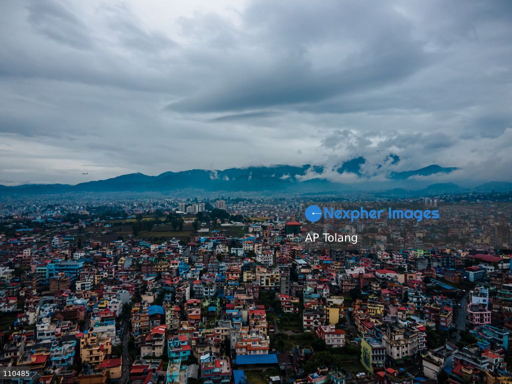Lalitpur, NEPAL – OCTOBER 30, 2026: An aerial view shows the cityscape under rainy skies in Lalitpur, Nepal. Continuous rainfall triggered by the remnants of Cyclone Arnab has blanketed the Kathmandu Valley, disrupting daily activities and leaving urban areas under persistent cloudy and wet conditions. (Photo by AP Tolang/Nexpher Images)