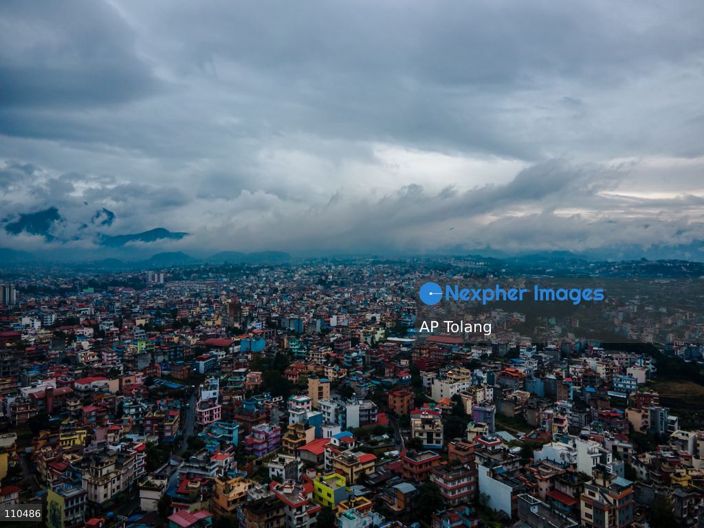 Lalitpur, NEPAL – OCTOBER 30, 2026: An aerial view shows the cityscape under rainy skies in Lalitpur, Nepal. Continuous rainfall triggered by the remnants of Cyclone Arnab has blanketed the Kathmandu Valley, disrupting daily activities and leaving urban areas under persistent cloudy and wet conditions. (Photo by AP Tolang/Nexpher Images)