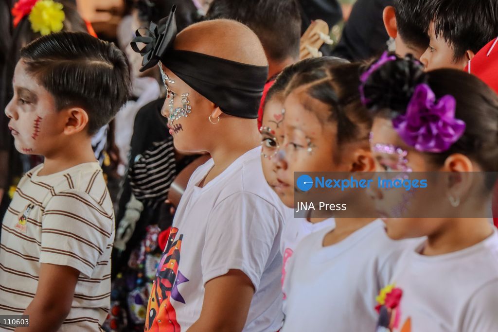 TUXTLA GUTIÉRREZ, MEXICO - OCTOBER 29, 2026: Children in colourful costumes and creative makeup, dressed as Catrinas, little skeletons and other traditional characters, get ready to celebrate Day of the Dead in the southern state of Chiapas. (Photo by Diego Pérez Gómez/JNA Press via Nexpher Images)