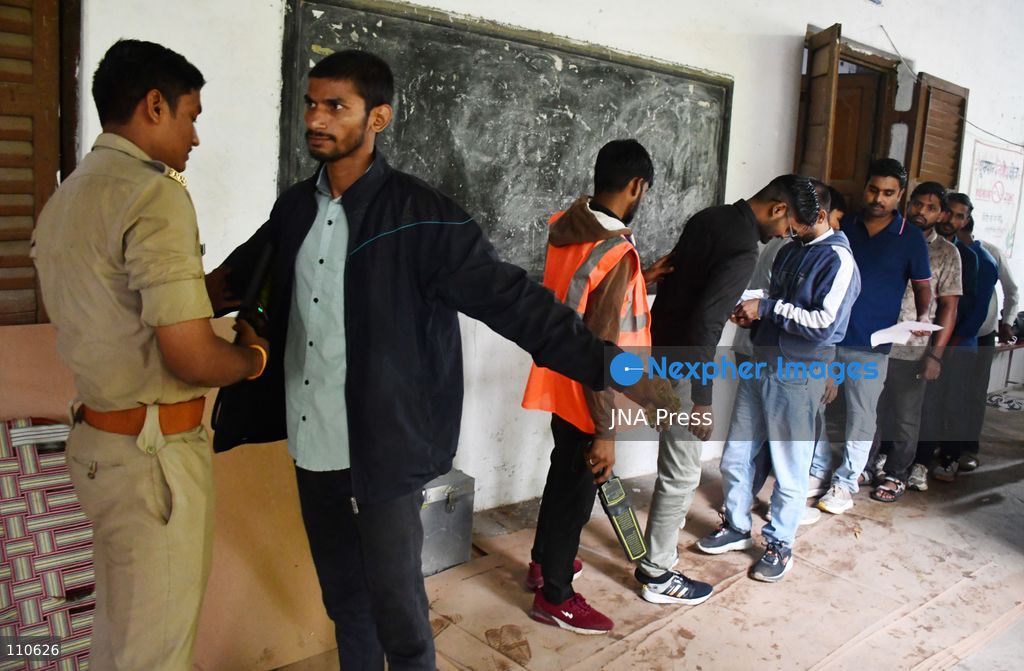 PRAYAGRAJ, INDIA - OCTOBER 30, 2026: Candidates undergo security checks and document verification before entering the examination centre to appear for the Uttar Pradesh Subordinate Services Selection Commission (UPSSSC) Preliminary Eligibility Test (PET), a state-level screening for government jobs, in Prayagraj. (Photo by Saurabh Kumar/JNA Press via Nexpher Images)