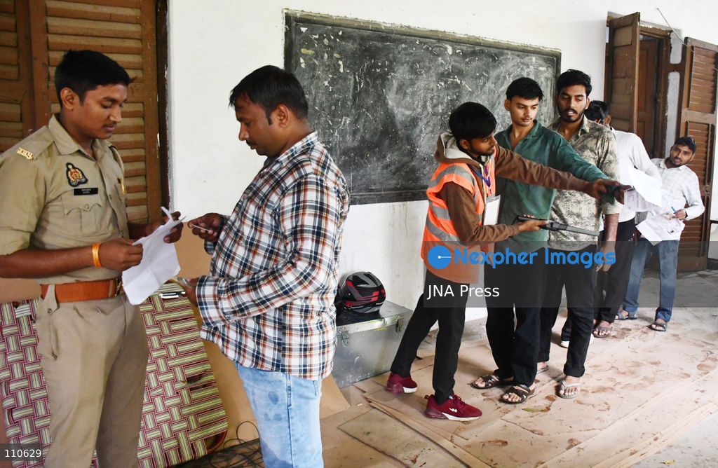 PRAYAGRAJ, INDIA - OCTOBER 30, 2026: Candidates undergo security checks and document verification before entering the examination centre to appear for the Uttar Pradesh Subordinate Services Selection Commission (UPSSSC) Preliminary Eligibility Test (PET), a state-level screening for government jobs, in Prayagraj. (Photo by Saurabh Kumar/JNA Press via Nexpher Images)