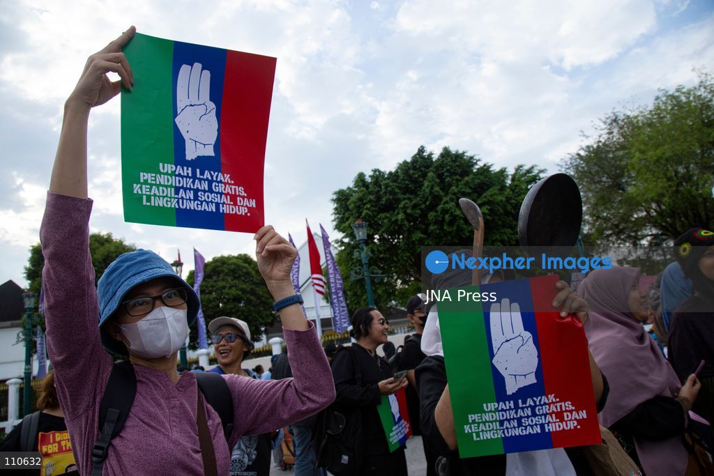 YOGYAKARTA, INDONESIA - OCTOBER 30, 2026: Members of the "Ibu Berisik" community staged a protest at the Zero Kilometer Marker in Yogyakarta, calling on the government to handle natural disasters with transparency and prioritize public safety, economic stability and basic needs. Protesters also demanded an end to division and guaranteed legal protection for citizens exercising freedom of expression. (Photo by Topen Anggara Saputra/JNA Press via Nexpher Images)