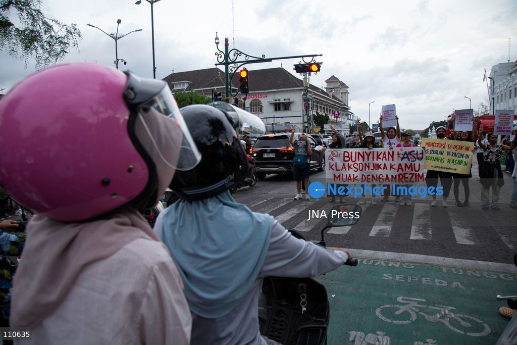 YOGYAKARTA, INDONESIA - OCTOBER 30, 2026: Members of the "Ibu Berisik" community staged a protest at the Zero Kilometer Marker in Yogyakarta, calling on the government to handle natural disasters with transparency and prioritize public safety, economic stability and basic needs. Protesters also demanded an end to division and guaranteed legal protection for citizens exercising freedom of expression. (Photo by Topen Anggara Saputra/JNA Press via Nexpher Images)