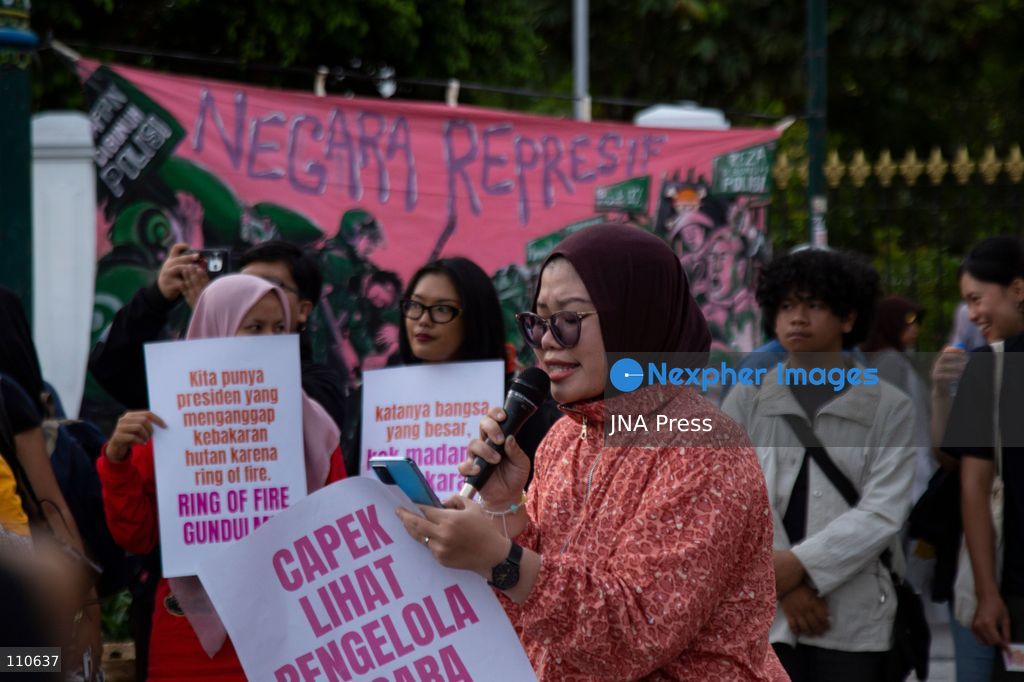YOGYAKARTA, INDONESIA - OCTOBER 30, 2026: Members of the "Ibu Berisik" community staged a protest at the Zero Kilometer Marker in Yogyakarta, calling on the government to handle natural disasters with transparency and prioritize public safety, economic stability and basic needs. Protesters also demanded an end to division and guaranteed legal protection for citizens exercising freedom of expression. (Photo by Topen Anggara Saputra/JNA Press via Nexpher Images)