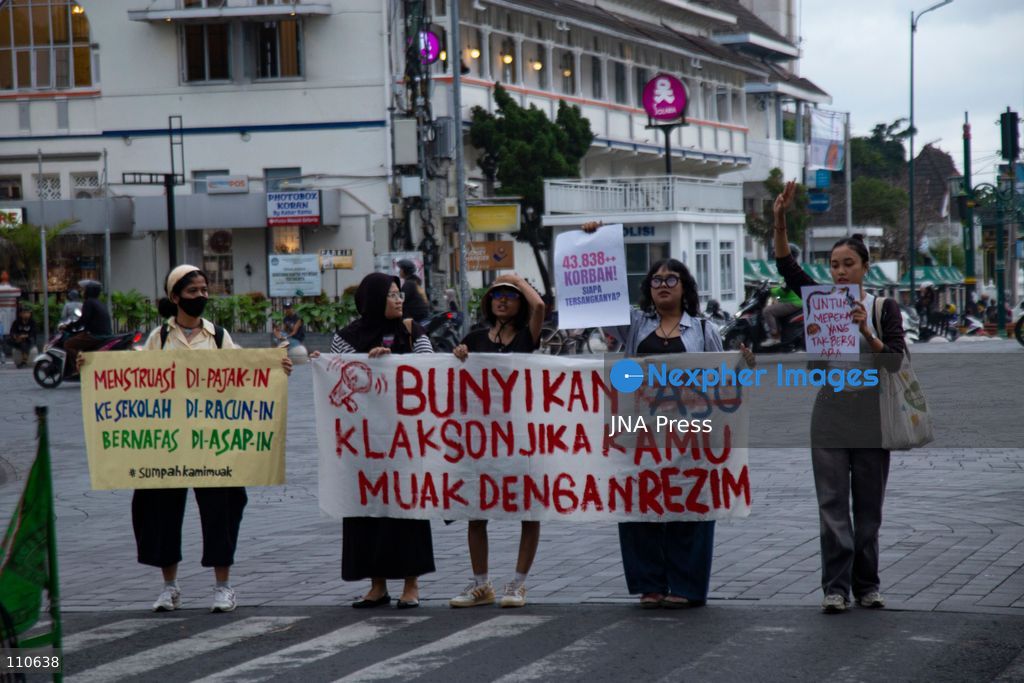 YOGYAKARTA, INDONESIA - OCTOBER 30, 2026: Members of the "Ibu Berisik" community staged a protest at the Zero Kilometer Marker in Yogyakarta, calling on the government to handle natural disasters with transparency and prioritize public safety, economic stability and basic needs. Protesters also demanded an end to division and guaranteed legal protection for citizens exercising freedom of expression. (Photo by Topen Anggara Saputra/JNA Press via Nexpher Images)