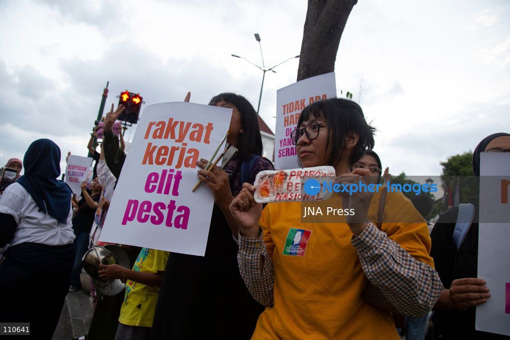 YOGYAKARTA, INDONESIA - OCTOBER 30, 2026: Members of the "Ibu Berisik" community staged a protest at the Zero Kilometer Marker in Yogyakarta, calling on the government to handle natural disasters with transparency and prioritize public safety, economic stability and basic needs. Protesters also demanded an end to division and guaranteed legal protection for citizens exercising freedom of expression. (Photo by Topen Anggara Saputra/JNA Press via Nexpher Images)
